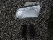 ox_toyota-corolla-verso-lampa-lewa-i-panele-wylacznikow-szyb